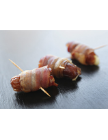 Dattes ou pruneaux farcies au fromage de brebis bardées de ventrèche